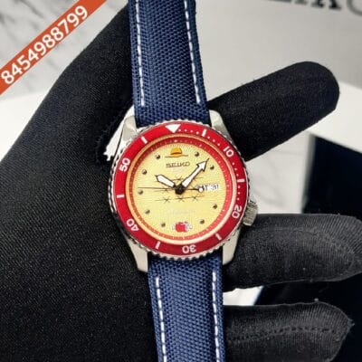 Seiko Sports Gold Dial Stainless Steel Case Blue Nylon Leather Strap Swiss Automatic Watch