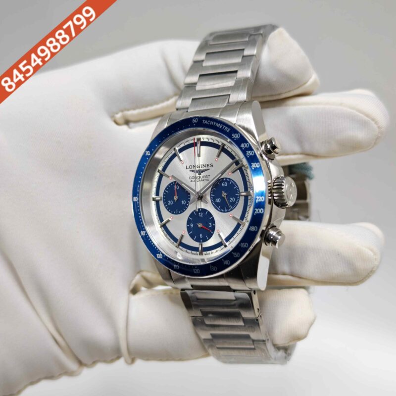 Longines Conquest Blue Chronograph Steel White Dial Blue Bazel Swiss Automatc Watch - Image 2